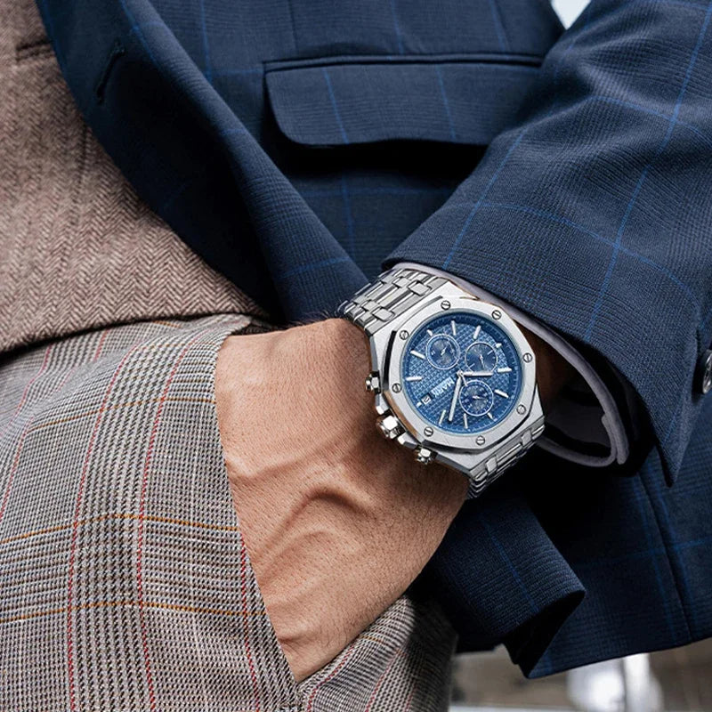 Luxury waterproof quartz watch for men in blue dial, worn with business suit