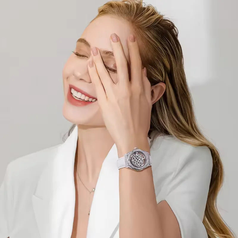 Mark Fairwhale 4465 LUXORA women’s iced-out watch with rotating star-shaped dial, stainless steel case, and crystal-encrusted bezel