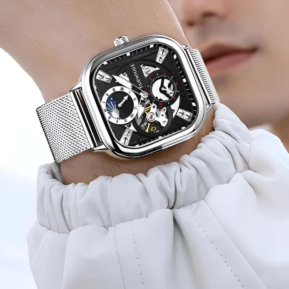 Mark Fairwhale 6290 ANERION automatic watch featuring silver skeleton dial with moon phase indicator and stainless steel mesh strap