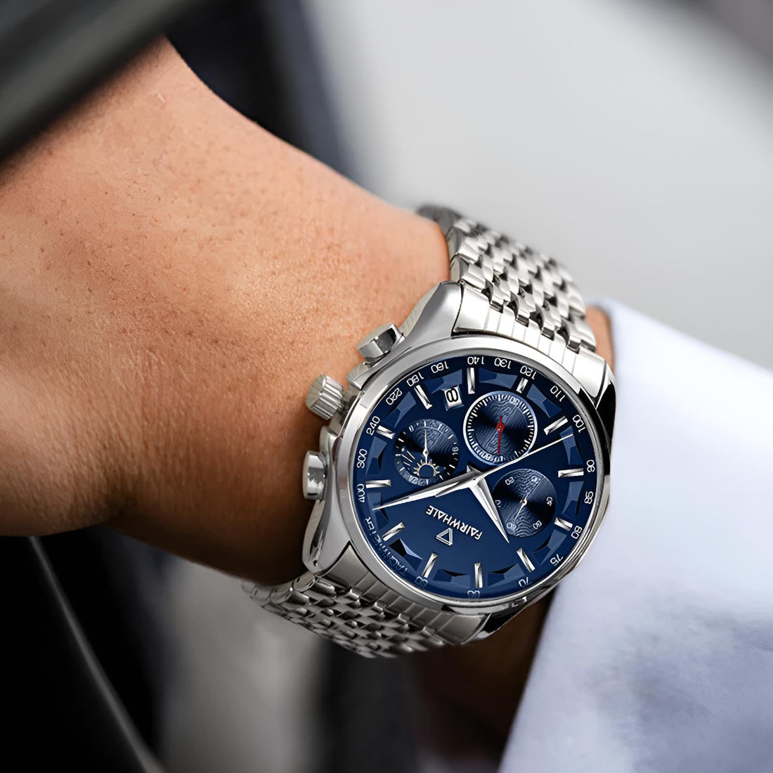 Mark Fairwhale AURION FW-5370 moon phase chronograph watch close-up with water droplets highlighting stainless steel case