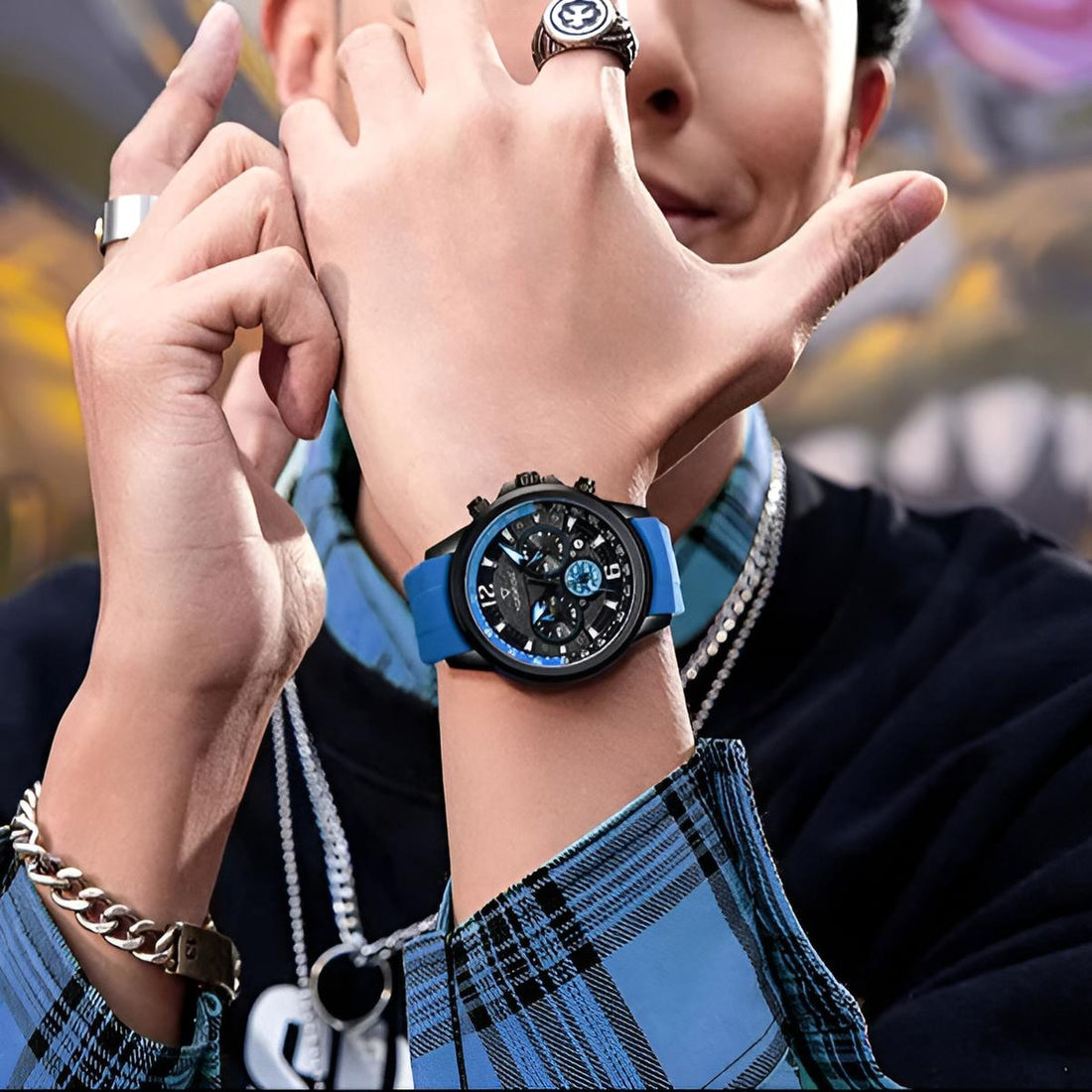 Stylish men’s street fashion chronograph watch Mark Fairwhale URBEX 5530 with blue silicone strap worn in urban outfit