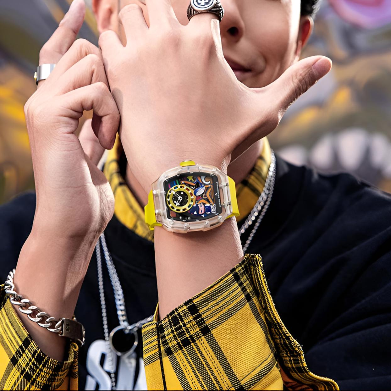 Lifestyle shot of Mark Fairwhale AERION men’s automatic sport watch with yellow rubber strap worn with streetwear.