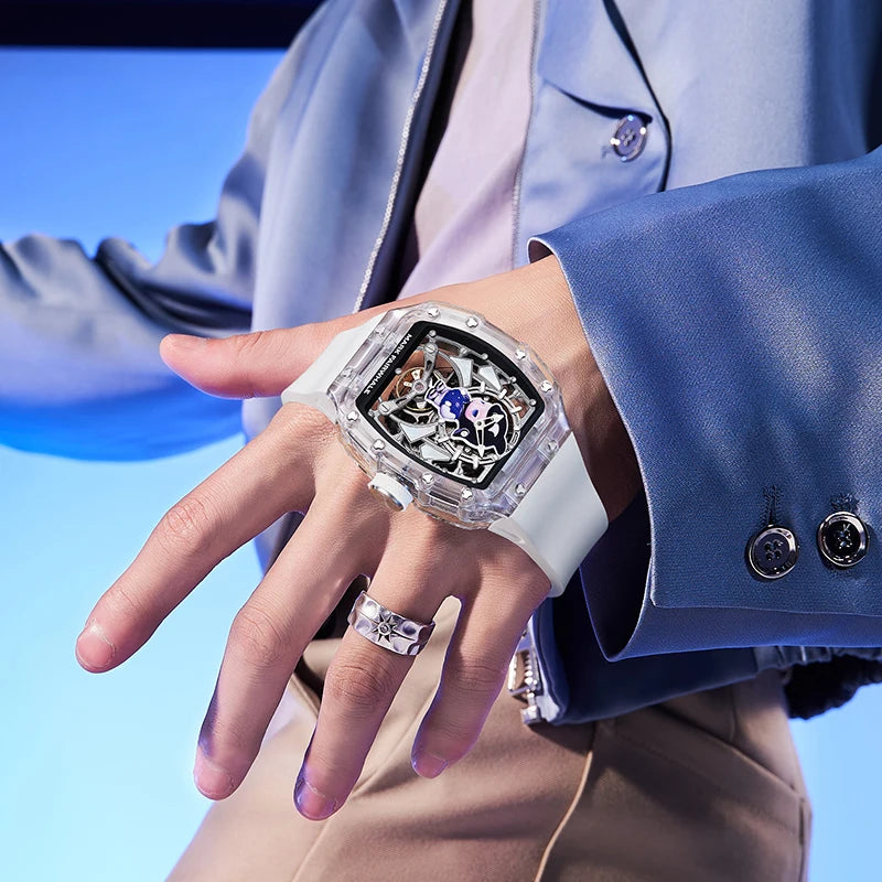 Stylish Mark Fairwhale LUXIUM skeleton watch worn on wrist with transparent case and rubber strap