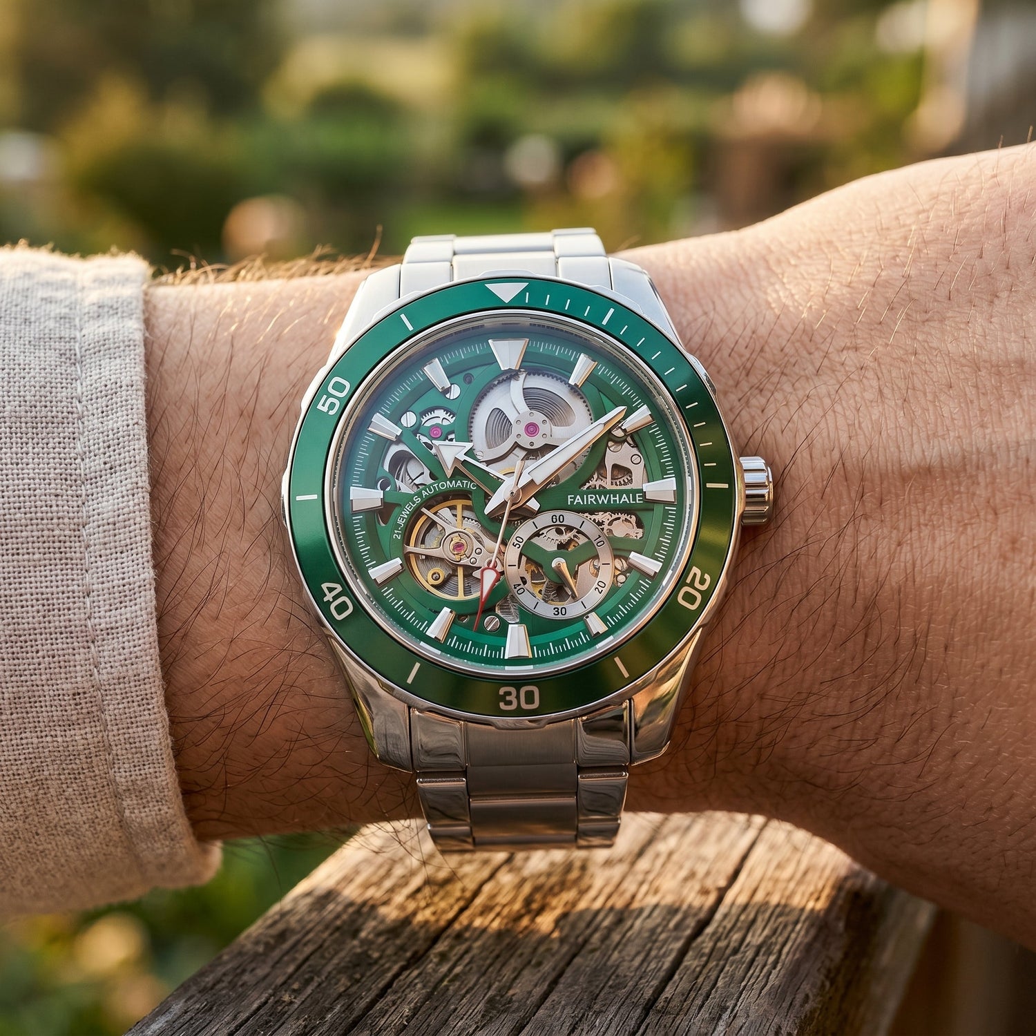 Green skeleton automatic men’s watch stainless steel bracelet wrist close-up luxury style