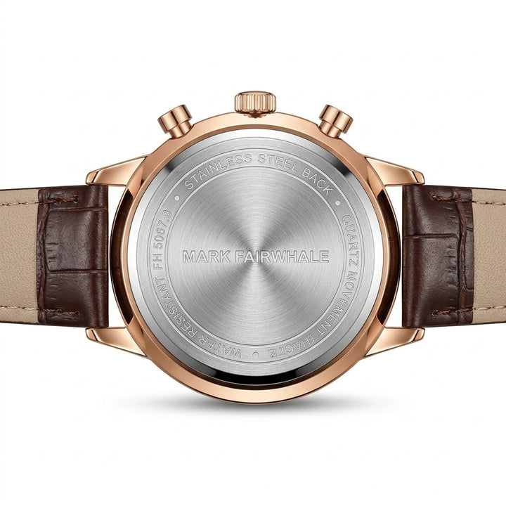 Back view of a Mark Fairwhale watch with brown leather strap and rose gold case.