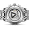 Back view of a silver wristwatch with brand name on a white background