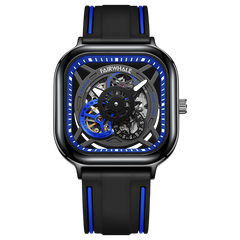 Black and blue watch with visible mechanism on a white background