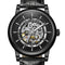 Black mechanical watch with visible gears on a white background