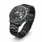 Black mechanical watch with a detailed face on a white background