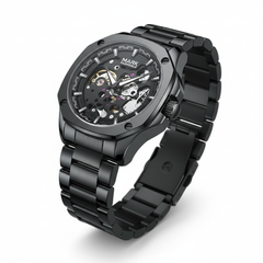 Black mechanical watch with a detailed face on a white background