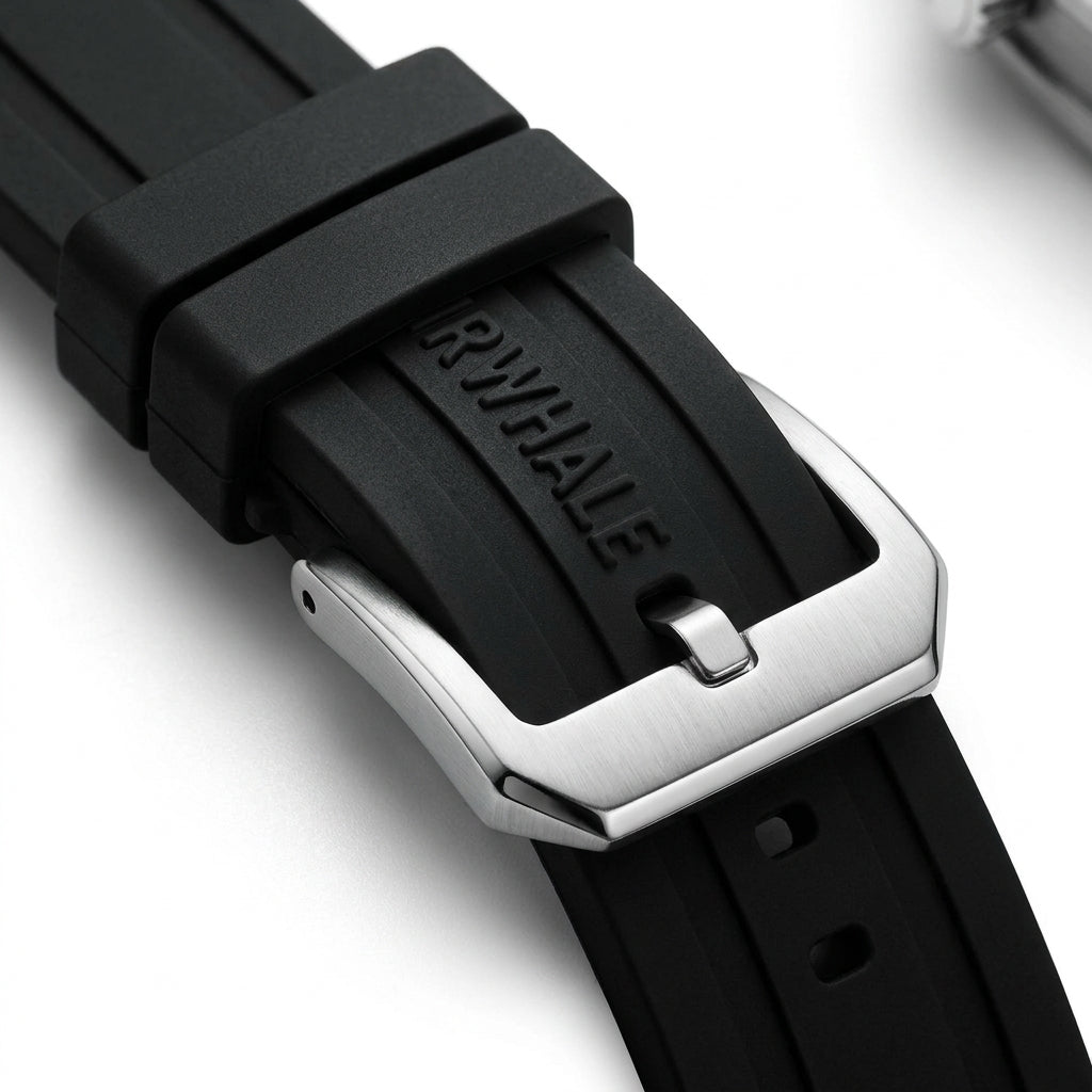 Black watch strap with silver clasp on a white background