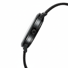 Black wristwatch with a braided strap on a white background
