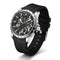 Black wristwatch with a detailed face on a white background