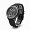 Black wristwatch with detailed mechanical components on a white background