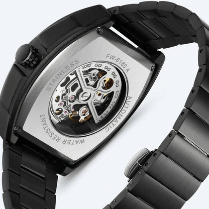 Black wristwatch with mechanical components on a white background