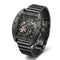 Black wristwatch with visible mechanical components on a white background