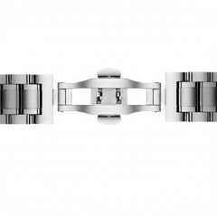 Close-up of a silver watch band on a white background