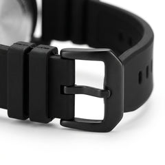 Close-up of a black watch strap with buckle on a white background