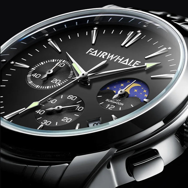 Close-up of Mark Fairwhale LUNARYS black dial moon phase indicator and chronograph sub-dials