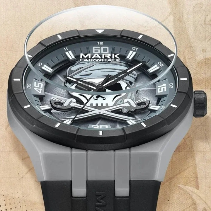 Close-up of Mark Fairwhale PIRATEX skull watch with scratch-resistant coated glass.
