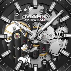 Close-up of a Mark Fairwhale mechanical watch with visible gears and components.