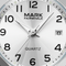 Close-up of a Mark Fairwhale watch face with black numbers and hands on a white background.