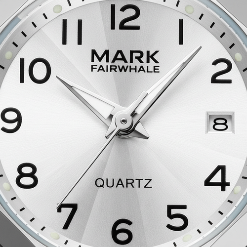 Close-up of a Mark Fairwhale watch face with black numbers and hands on a white background.