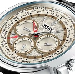 Close-up of a Mark Fairwhale watch with world time display