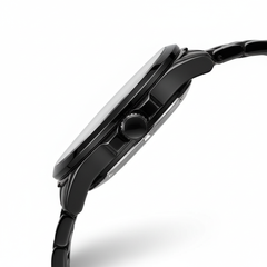 Close-up of a black smartwatch on a white background