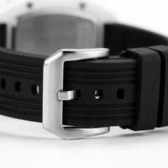 Close-up of a black watch strap with a silver buckle on a white background