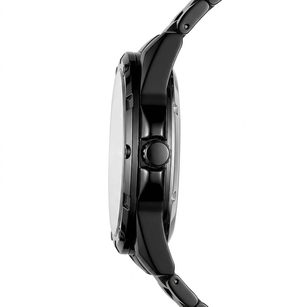 Close-up of a black wristwatch on a white background