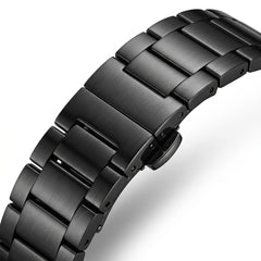Close-up of a black metal watch strap on a white background