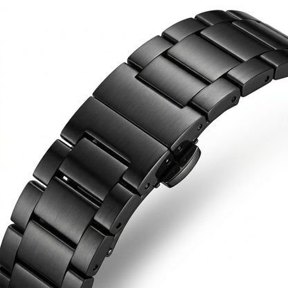 Close-up of a black metal watch strap on a white background