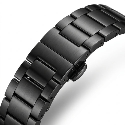 Close-up of a black metal watch strap on a white background