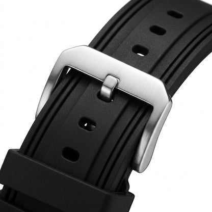Close-up of a black watch strap with a silver buckle on a white background