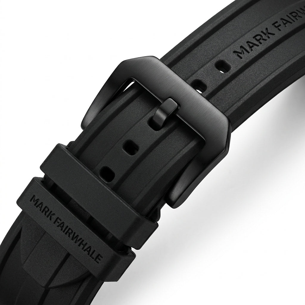 Close-up of a black watch strap with &