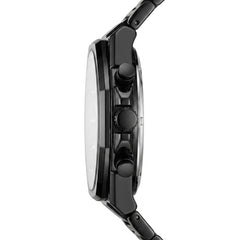 Close-up of a black watch with detailed design on a white background