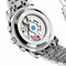 Close-up of a mechanical watch with visible brand name on a white background