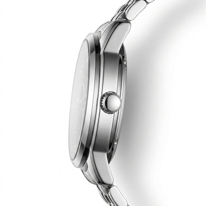 Close-up of a silver watch with a white background