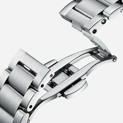 Close-up of a silver watch strap on a white background
