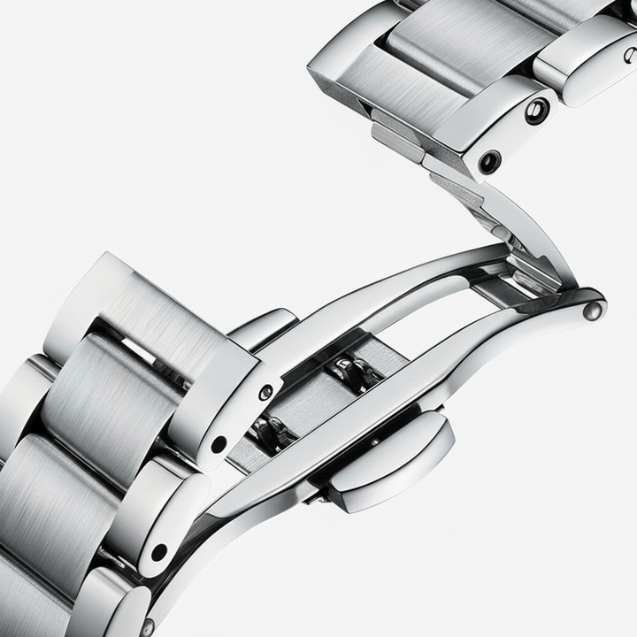 Close-up of a silver watch strap on a white background