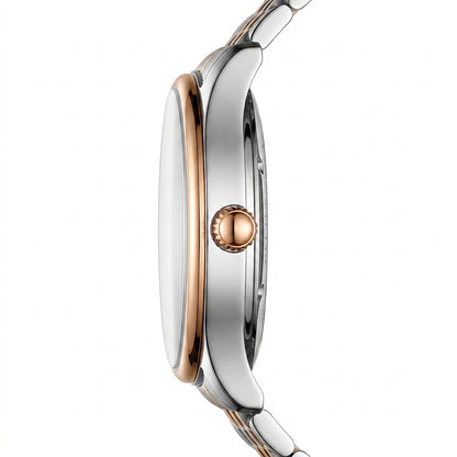 Close-up of a silver and rose gold watch on a white background