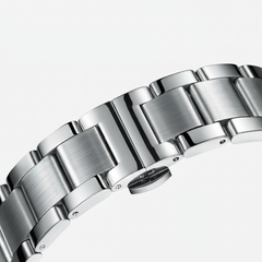 Close-up of a silver metal watch bracelet on a white background