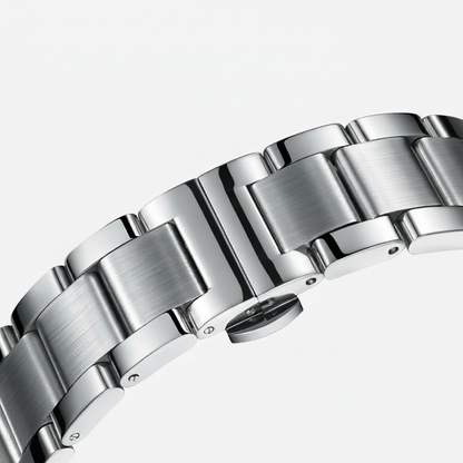 Close-up of a silver metal watch bracelet on a white background