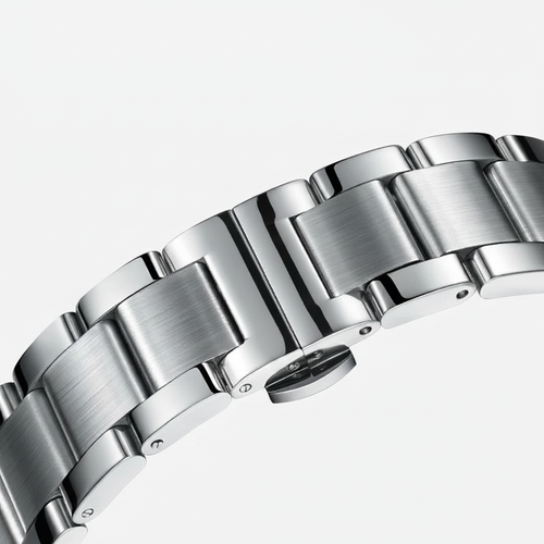 Close-up of a silver metal watch bracelet on a white background