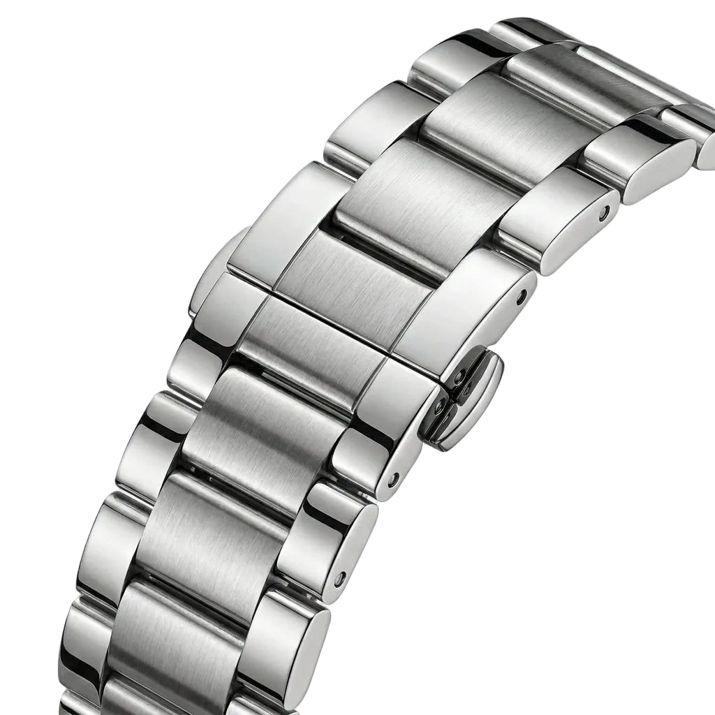 Close-up of a silver metal watch strap on a light gray background