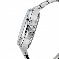 Close-up of a silver watch with a white background