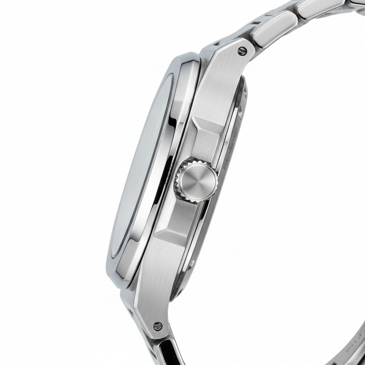 Close-up of a silver watch with a white background