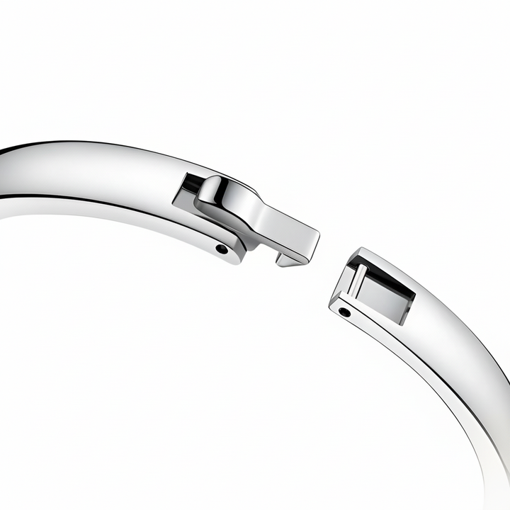 Close-up of a silver bracelet on a white background