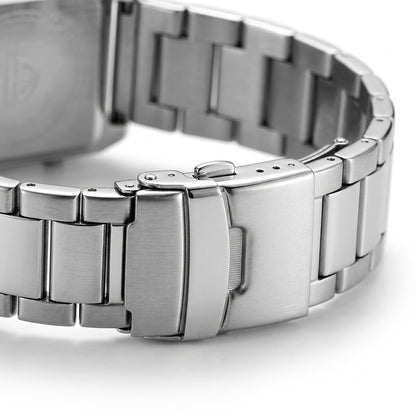 Close-up of a silver metal watch band on a white background